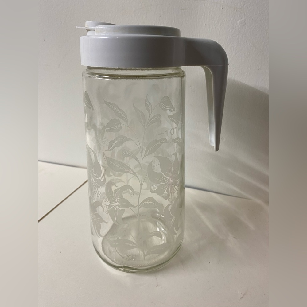 Vintage glass TANG juice pitcher with lid and flip top